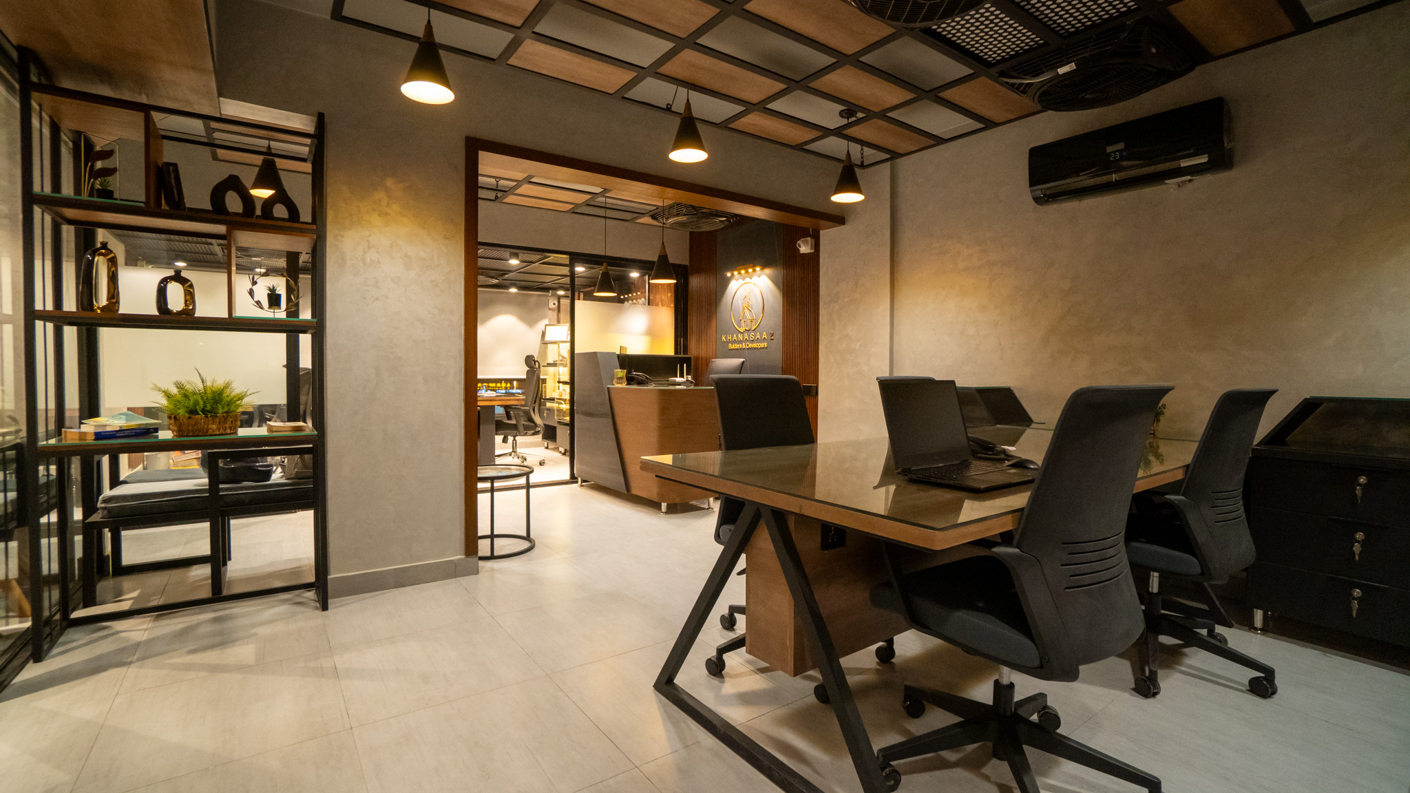 Passage carved from indigenous stone with indoor foliage